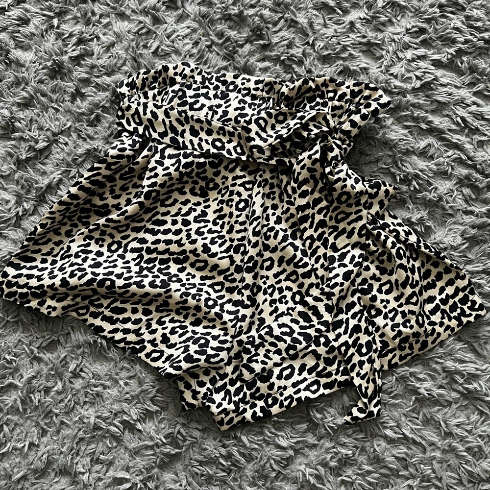 High waisted cheetah shirts. Silky material with tie belt. Never worn.